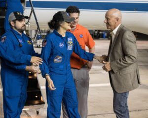 Sunita Williams was greeted by Steve Koerner, Johnson's acting center director.